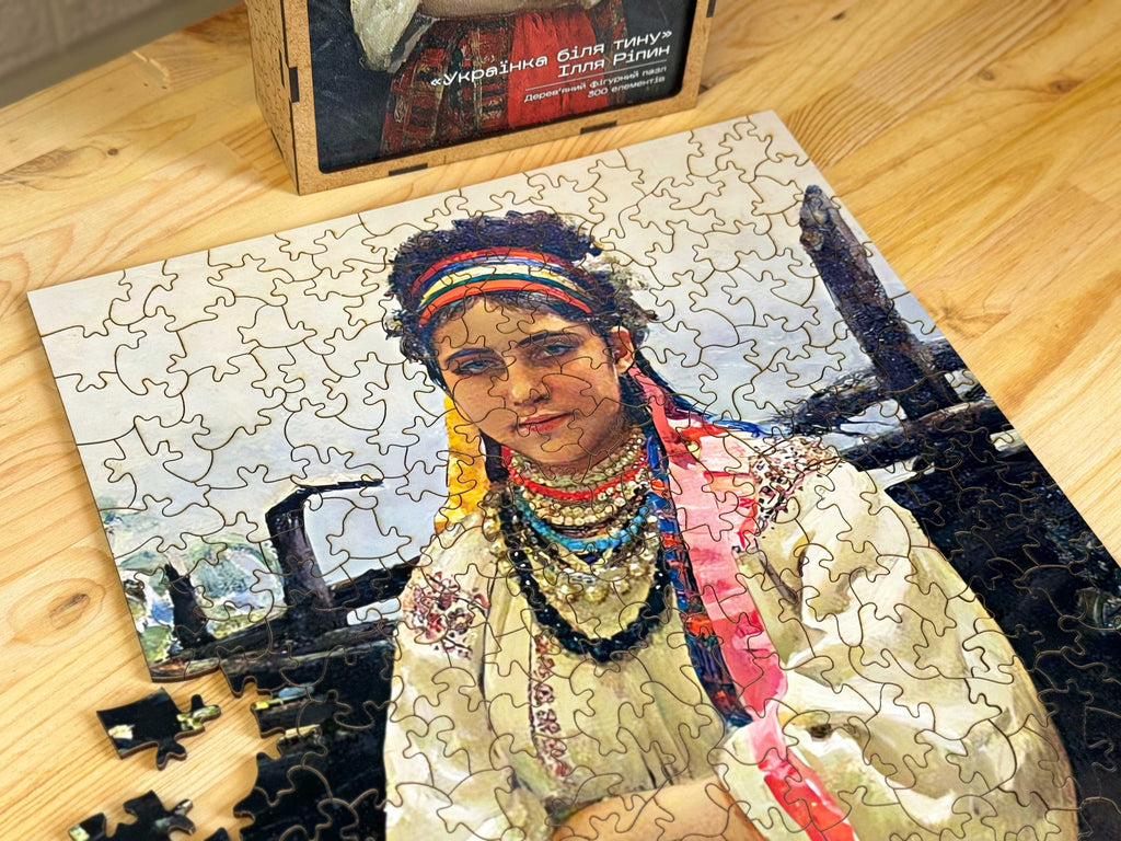 Wooden shaped puzzle "Ukrainian woman by the wattle fence. Ilya Repin" 300 pieces